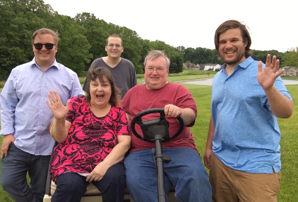 The Smith family together — Matt, in the grey shirt, passed away at 27 from kidney failure